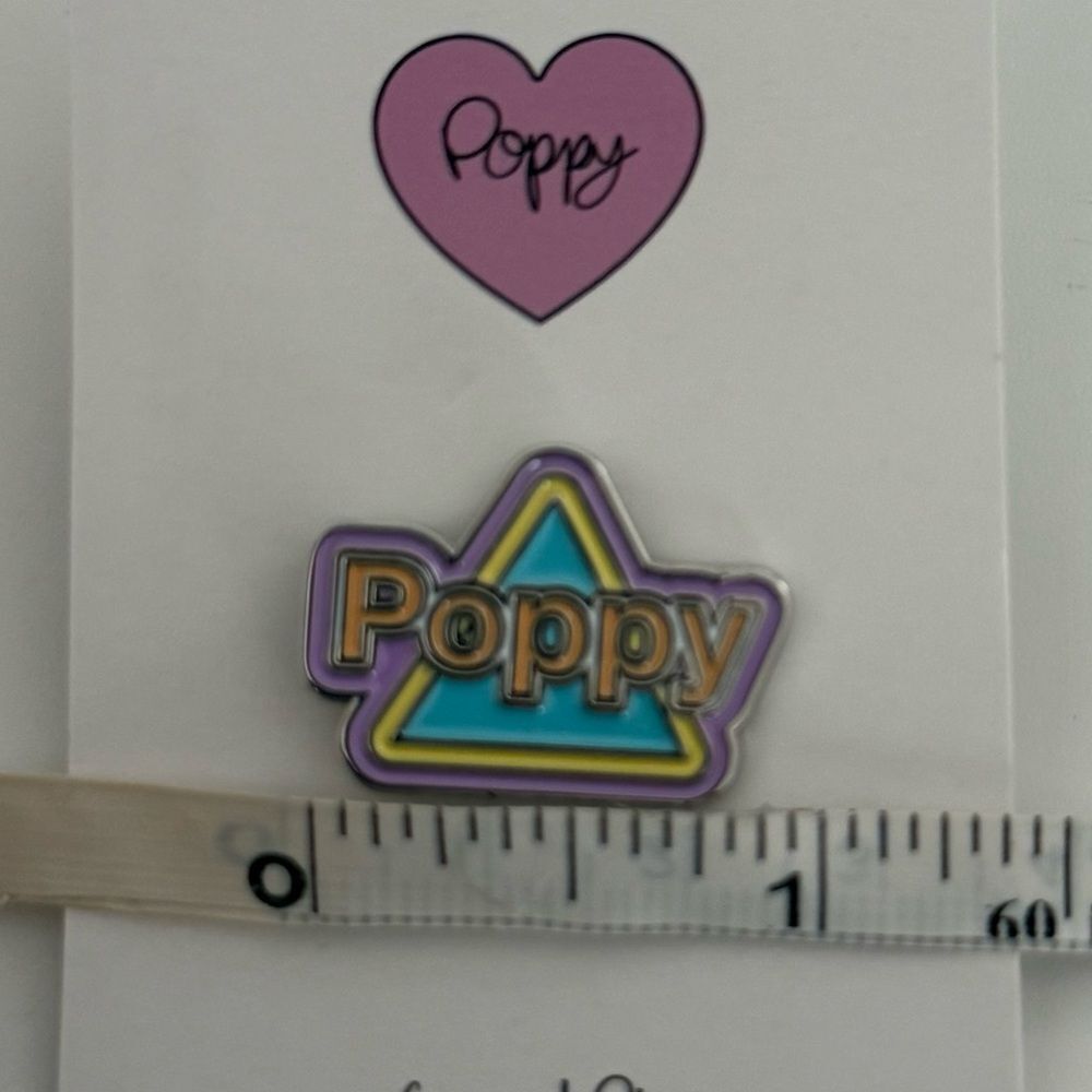 POPPY TRIANGLE LOGO ENAMEL LAPEL PIN - Picture 2 of 2